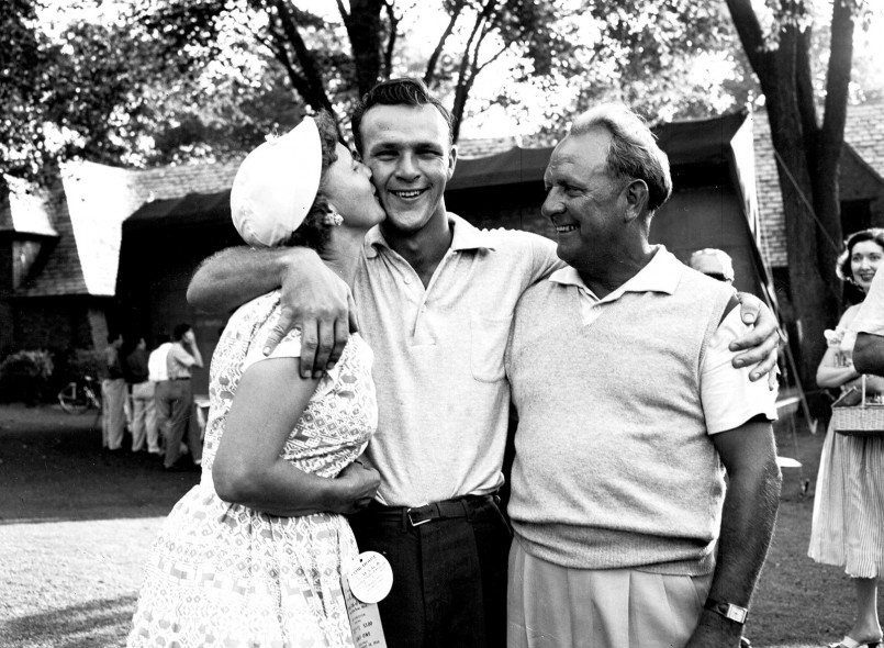 Mr. Palmer celebrates his marathon victory with his parents