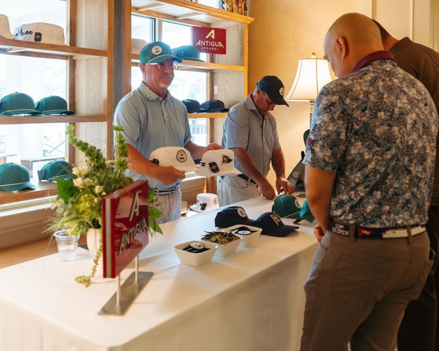 Custom Kingdom Cup hats provided by Antigua Apparel